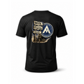 A black short-sleeve t-shirt shown from the back, featuring a large graphic print on the center back with a vintage-style 'Milk Farm Dixon' sign and a circular 'TEAM ALPHA' emblem.