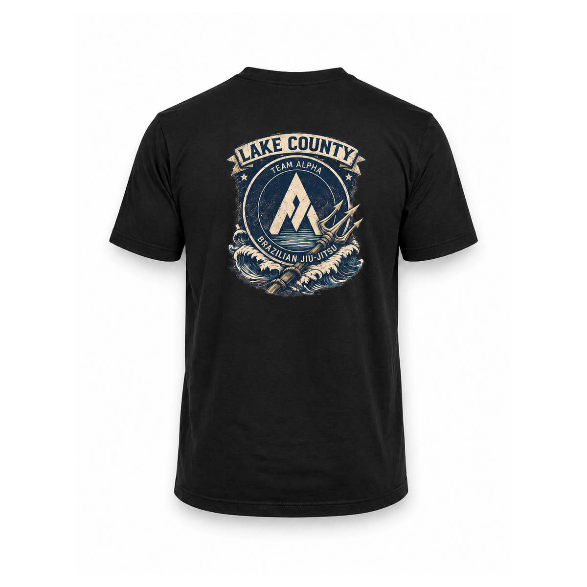 A black short-sleeve t-shirt shown from the back, featuring a large circular graphic print with the text 'LAKE COUNTY TEAM ALPHA' and 'BRAZILIAN JU-JITSU' in cream and blue tones.