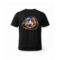 A black short-sleeve t-shirt shown from the back, featuring a large circular graphic print on the upper back. The graphic depicts a glowing orange and yellow bridge over water with a blue circular emblem in the center containing a white mountain-like logo and the text 'TEAM ALPHA SACRAMENTO'
