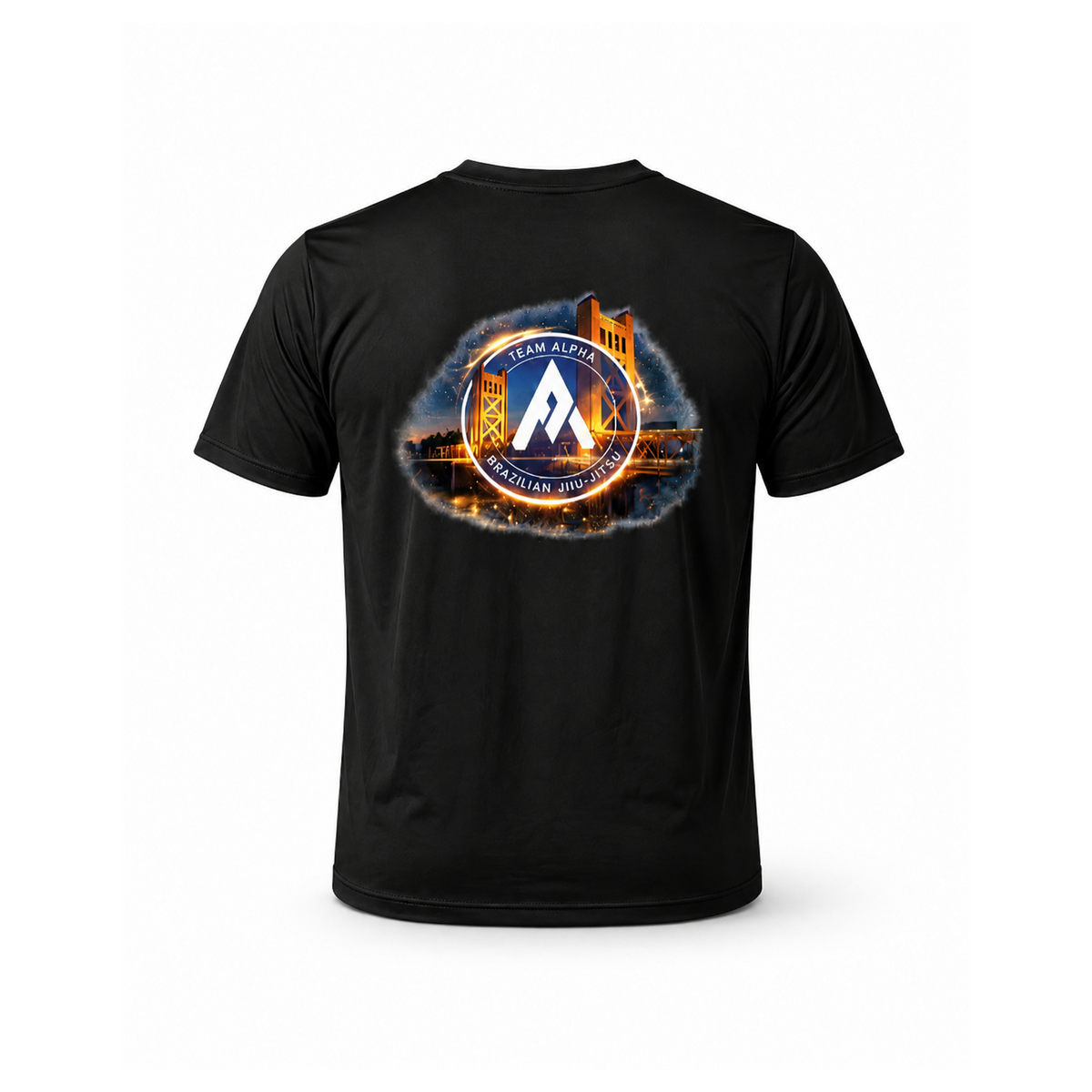 A black short-sleeve t-shirt shown from the back, featuring a large circular graphic print on the upper back. The graphic depicts a glowing orange and yellow bridge over water with a blue circular emblem in the center containing a white mountain-like logo and the text 'TEAM ALPHA SACRAMENTO'